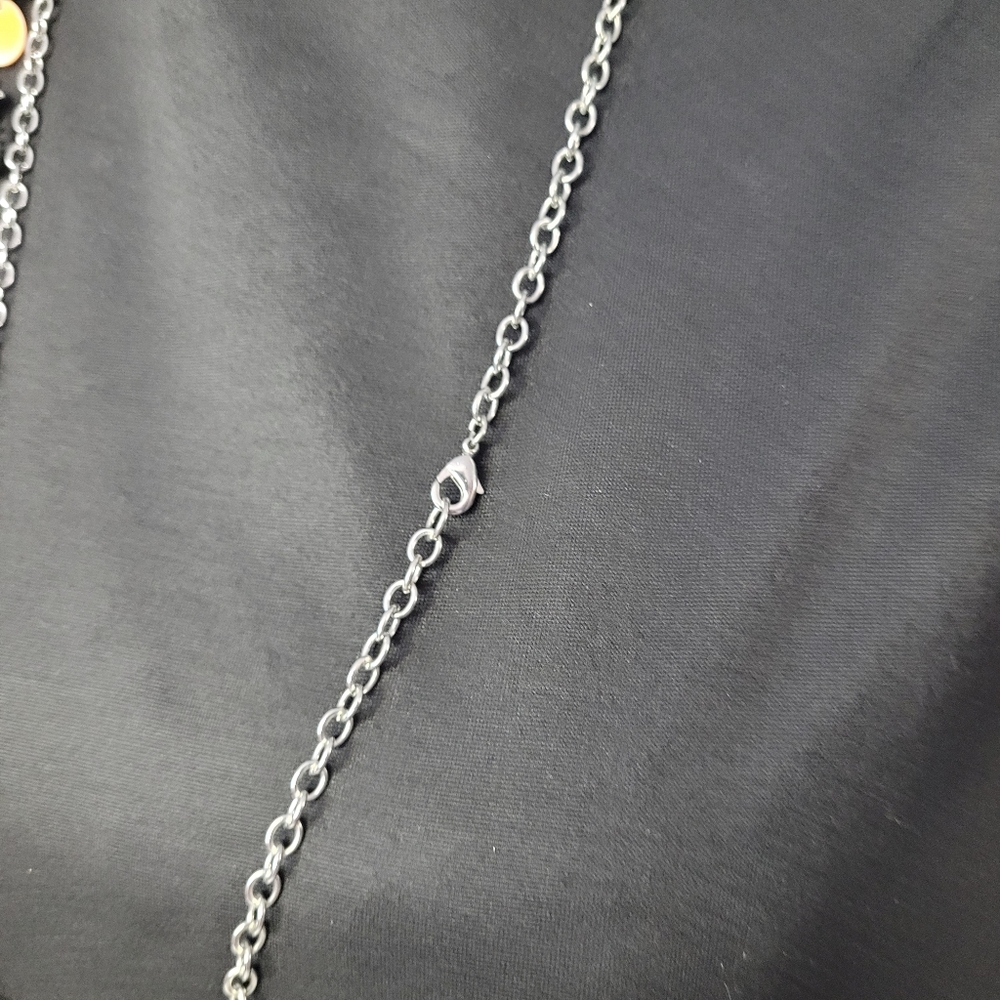 Silvertone Necklace with a collage of items 32 inch chain - Picture 4 of 4